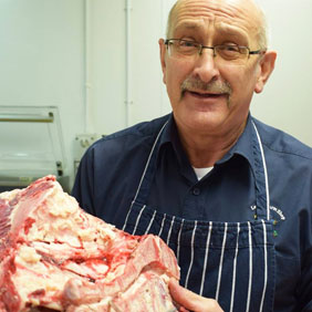 Butcher at Lewis&rsquo;s Farm Shop in Wrexham